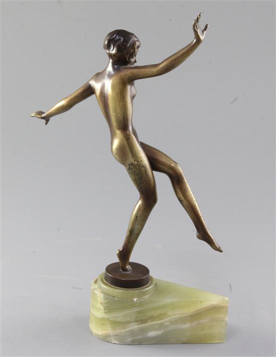 A Lorenzl Art Deco bronzed figure of a nude dancing girl, height 11in.